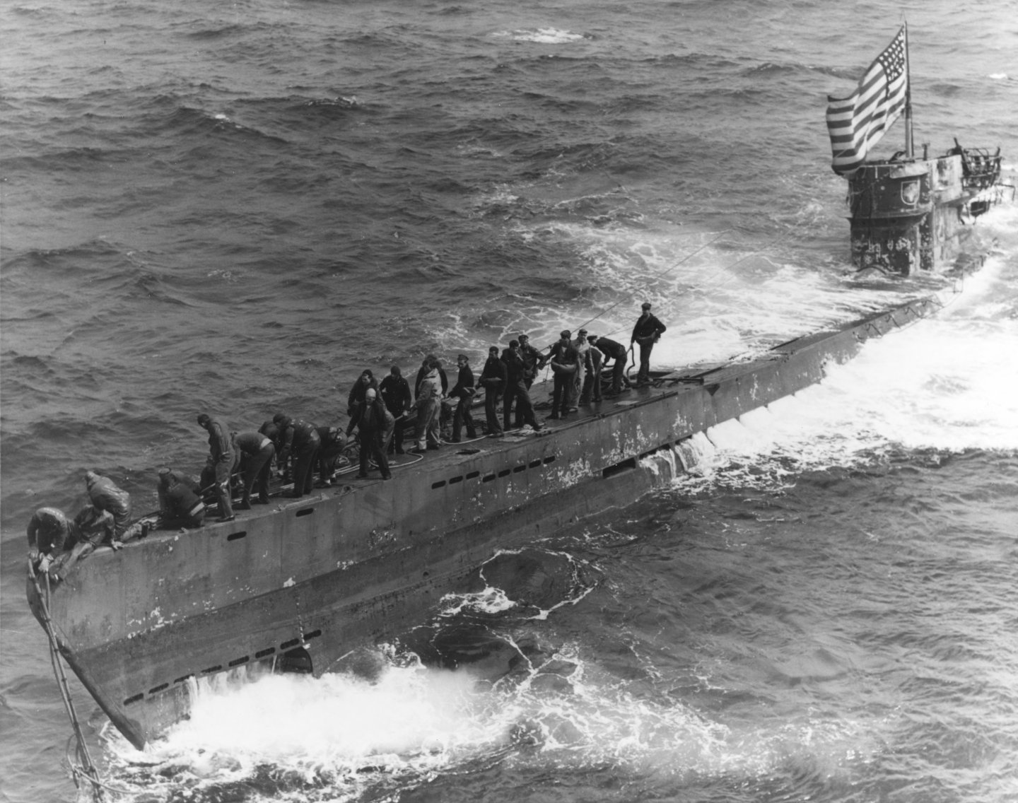 A_U.S._Navy_boarding_party_working_to_secure_a_tow_line_to_the_bow_of_the_captured_German_submarine_U-505%2C_4_June_1944_%2880-G-49172%29.jpg