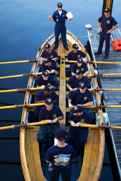 US_Navy_090818-N-0167W-042_USS_Constitution_crewmember_Boatswains_Mate_2nd_Class_Garrett_Renner_guides_a_team_of_Navy_chief_selects_in_the_port_whaleboat_of_USS_Constitution.jpg