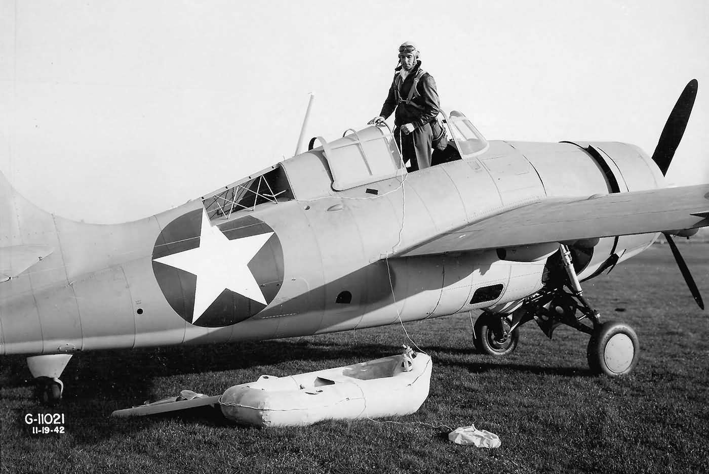 F4F_Wildcat_Grumman_test_pilot_Corwin_Meyer_demonstrating_the_deployment_of_the_pilots_life_raft_19_November_1942.jpg.1538293fd9158fdc48a15356b38c35e5.jpg