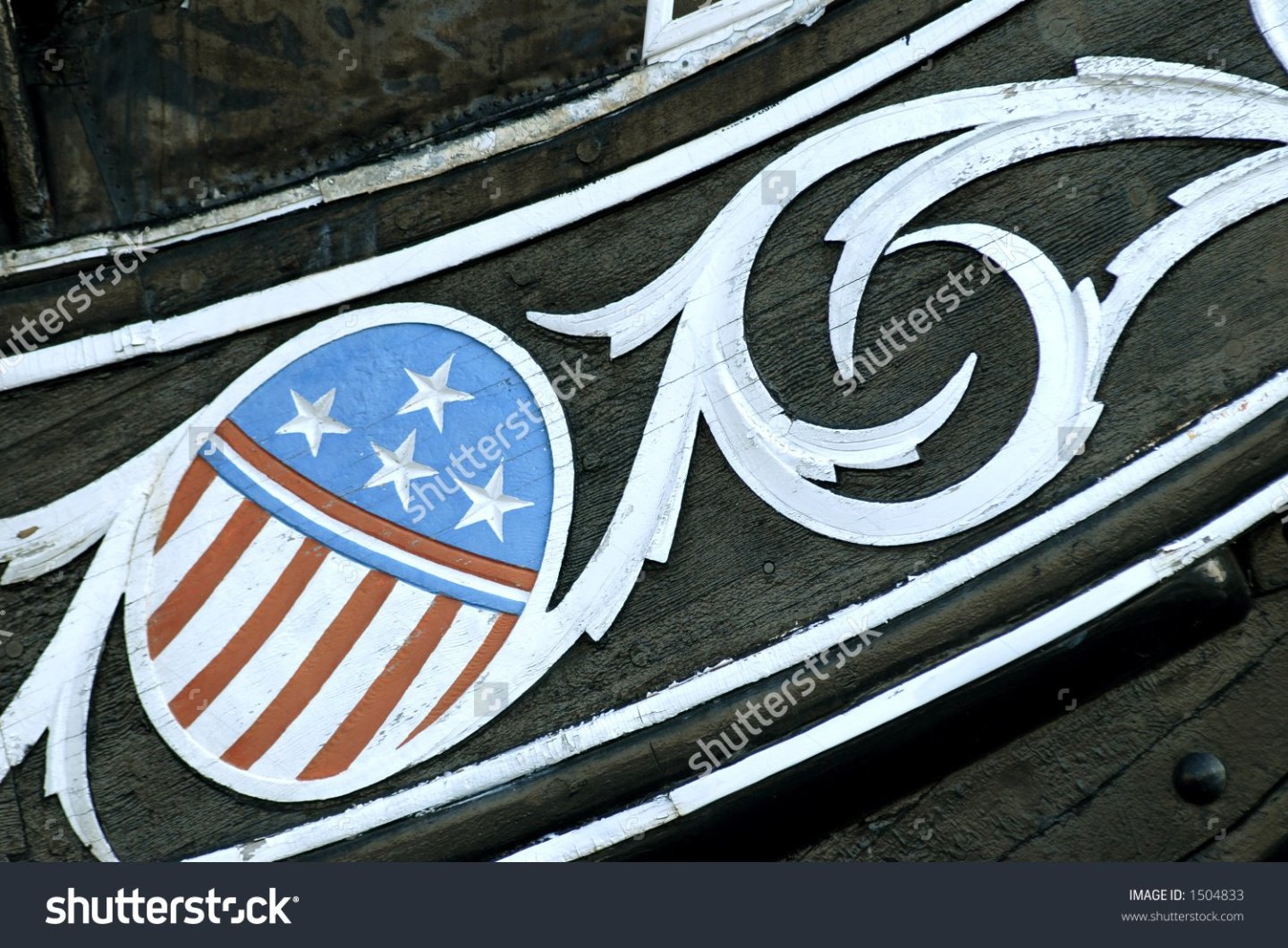 stock-photo-carving-of-the-stars-and-stripes-on-the-bow-of-the-uss-constitution-in-boston-harbor-1504833.jpg