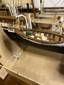 Lifeboat with carpenter's tool chest and wood.